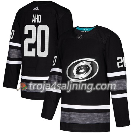 Carolina Hurricanes tröja Sebastian Aho 20 Svart 2019 All-Star Adidas Authentic - NHL Tröjor Herr Carolina Hurricanes tröja Sebastian Aho 20 Svart 2019 All-Star Adidas Authentic - NHL Tröjor Herr